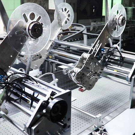 Rigid-box visual positioning machine in operation at JCL Packaging